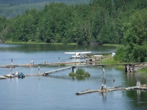 Image of seaplane moored on Stuart Lake. Life is good here.